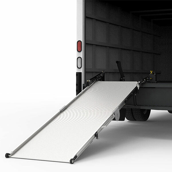 A Link Swivel Ramp extended out of the rear of a box truck.