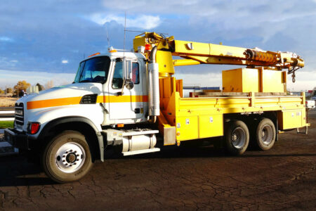 A crane truck with an Air Link Suspension