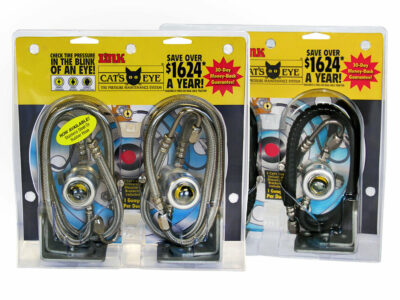 Two steel hose Cat's Eye units in a bubble pack in front of two rubber hose Cat's Eye units in a bubble pack