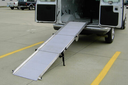 A Link mounted ramp deployed from the back of a cargo van