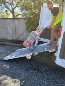 Man dollying drinks down extended LSR90 swivel ramp