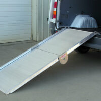 A Link portable ramp deployed from the back of a cargo van